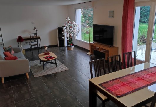 Large bright living room with offic
