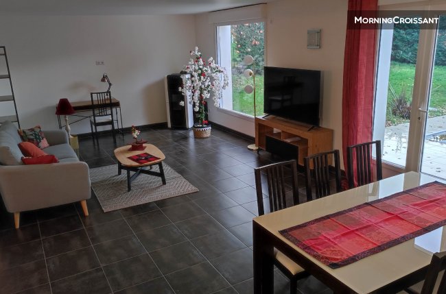 Large bright living room with offic