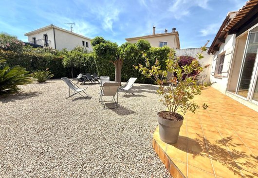 House close to sea with garden