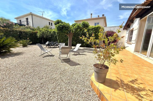 House close to sea with garden