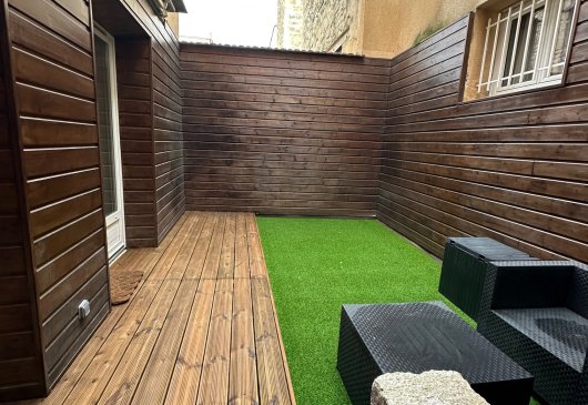 Furnished 2-room flat with garden